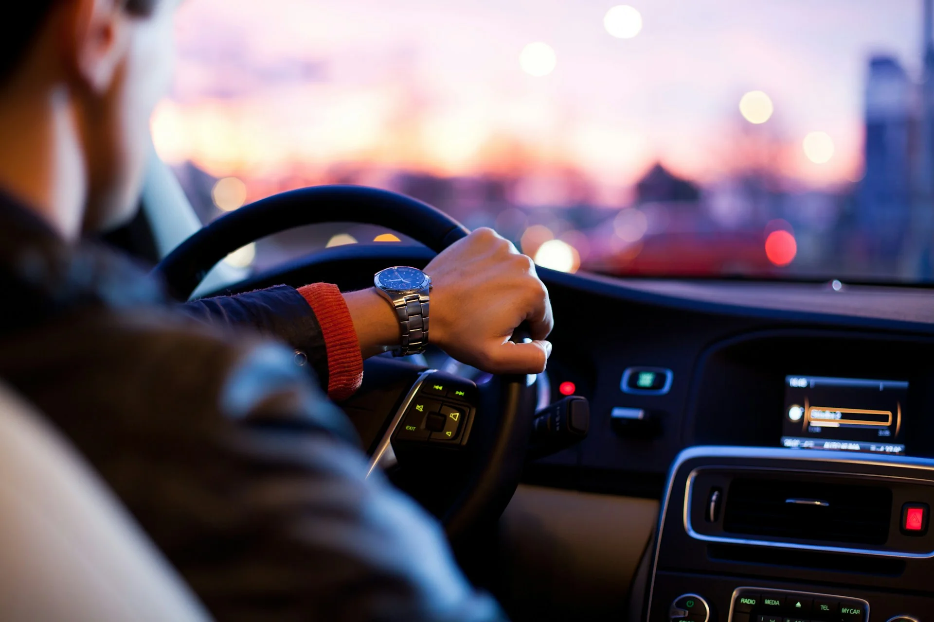 Luxury limousine interior with leather seating and ambient lighting